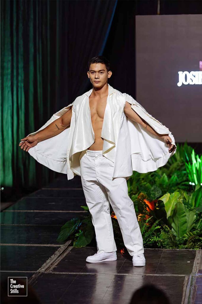 Antonio “Thirdy” Gamalinda III wearing a white Josip Tumapa Design runway look