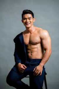 Antonio “Thirdy” Gamalinda III in a studio portrait showing his athletic physique and formalwear styling