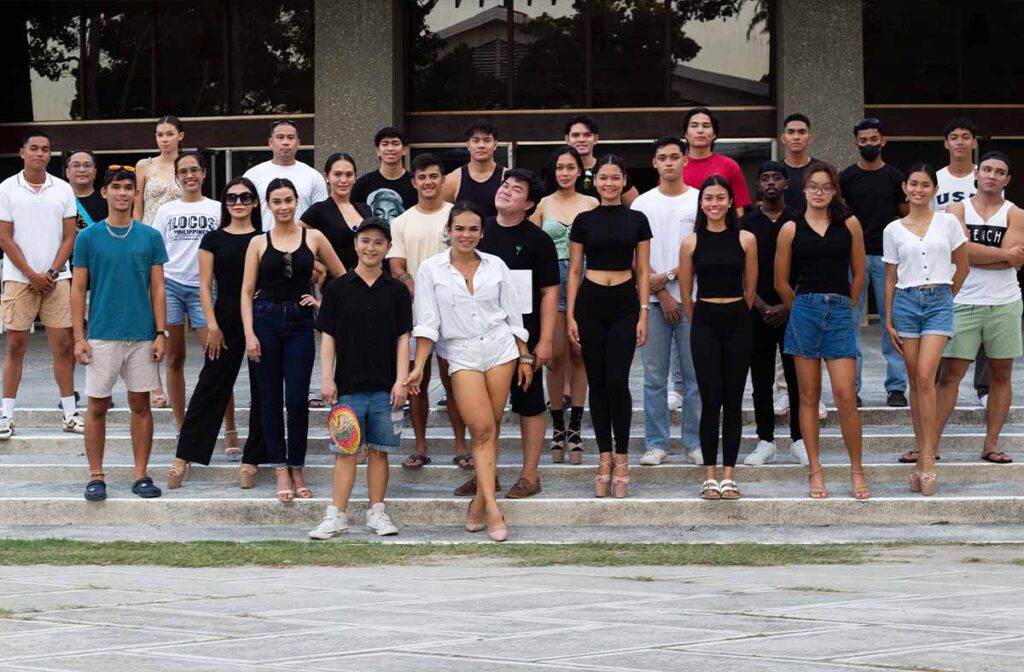 Josip Tumapa with models and the fashion show team during a rehearsal