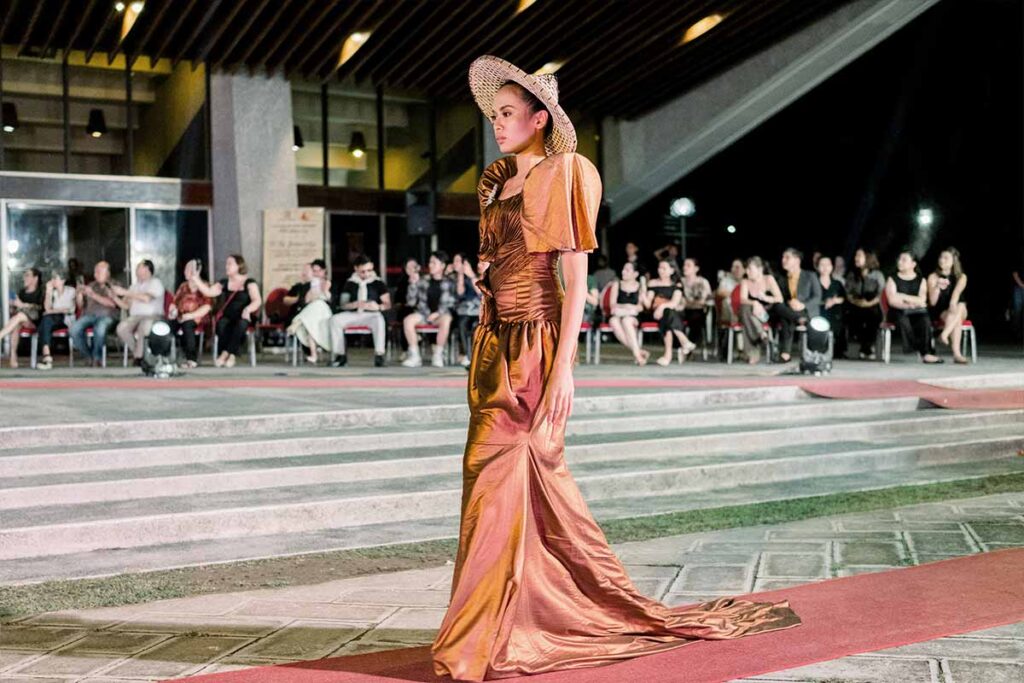 Model wearing a bronze terno from Josip Tumapa’s collection