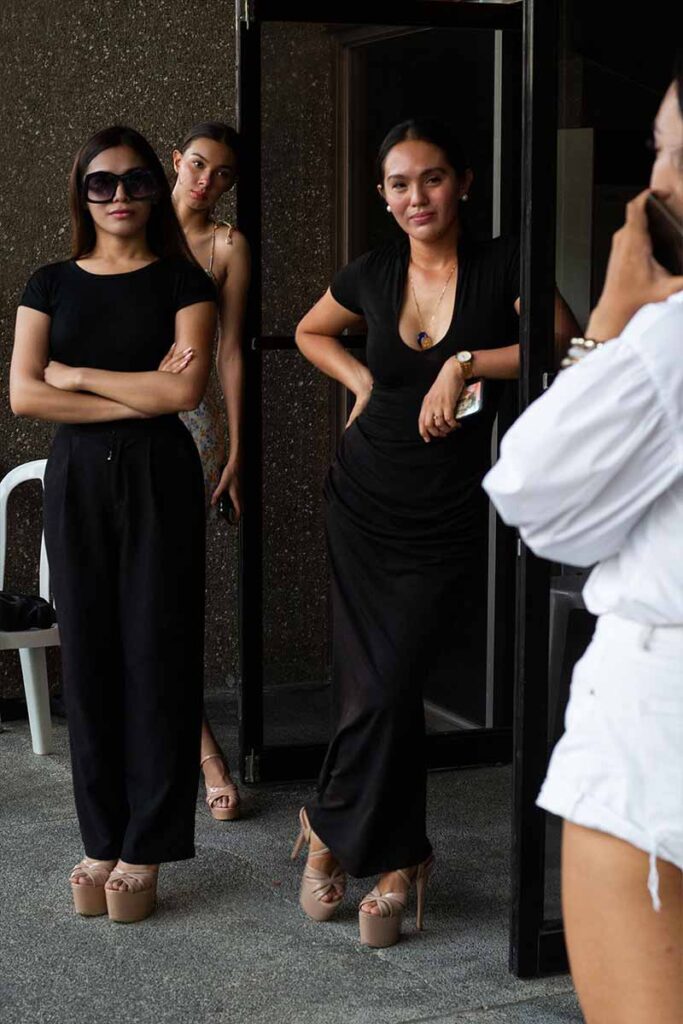 Three models during the fashion show rehearsal one day before the show
