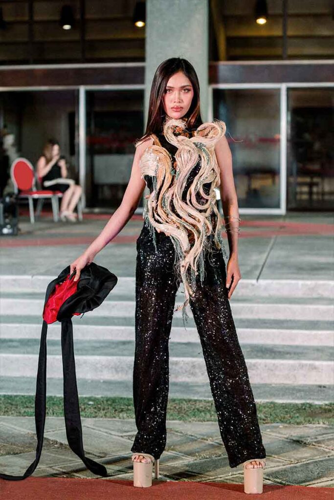 Model wearing a sculptural black look from Tingting Delfin’s collection